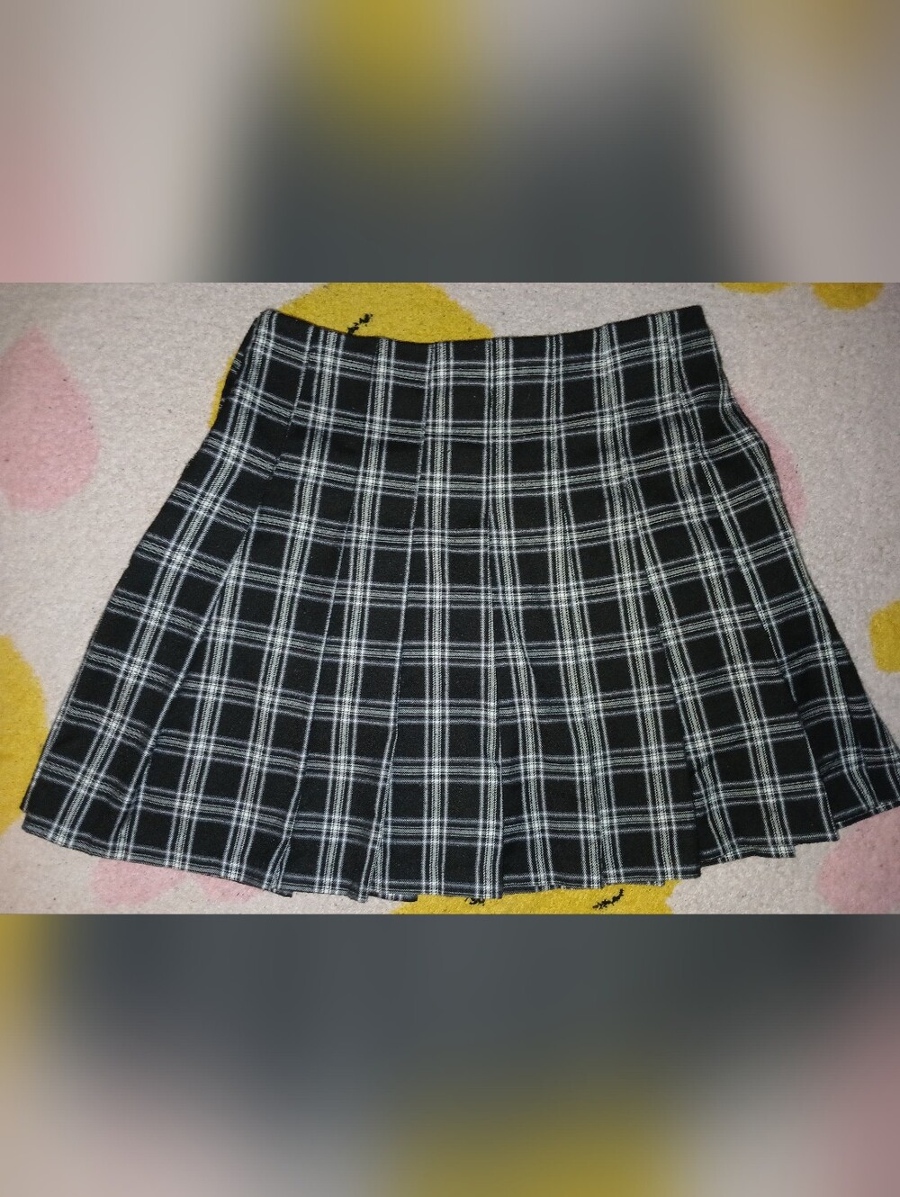 Pre-loved Girl's Black & White Plaid Pleated Mini Skirt.